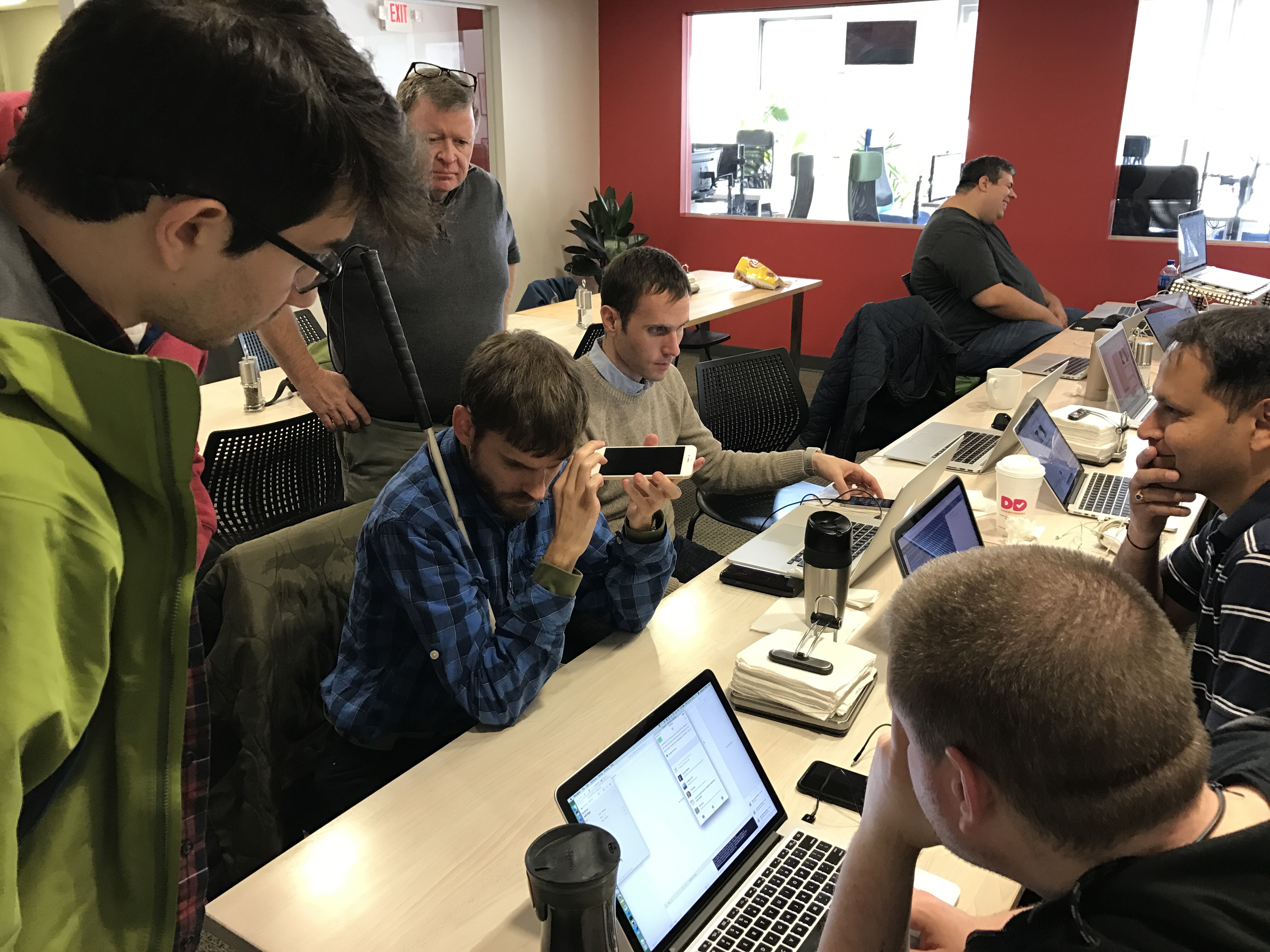 Group of Programmers using Voice Over on iPhone