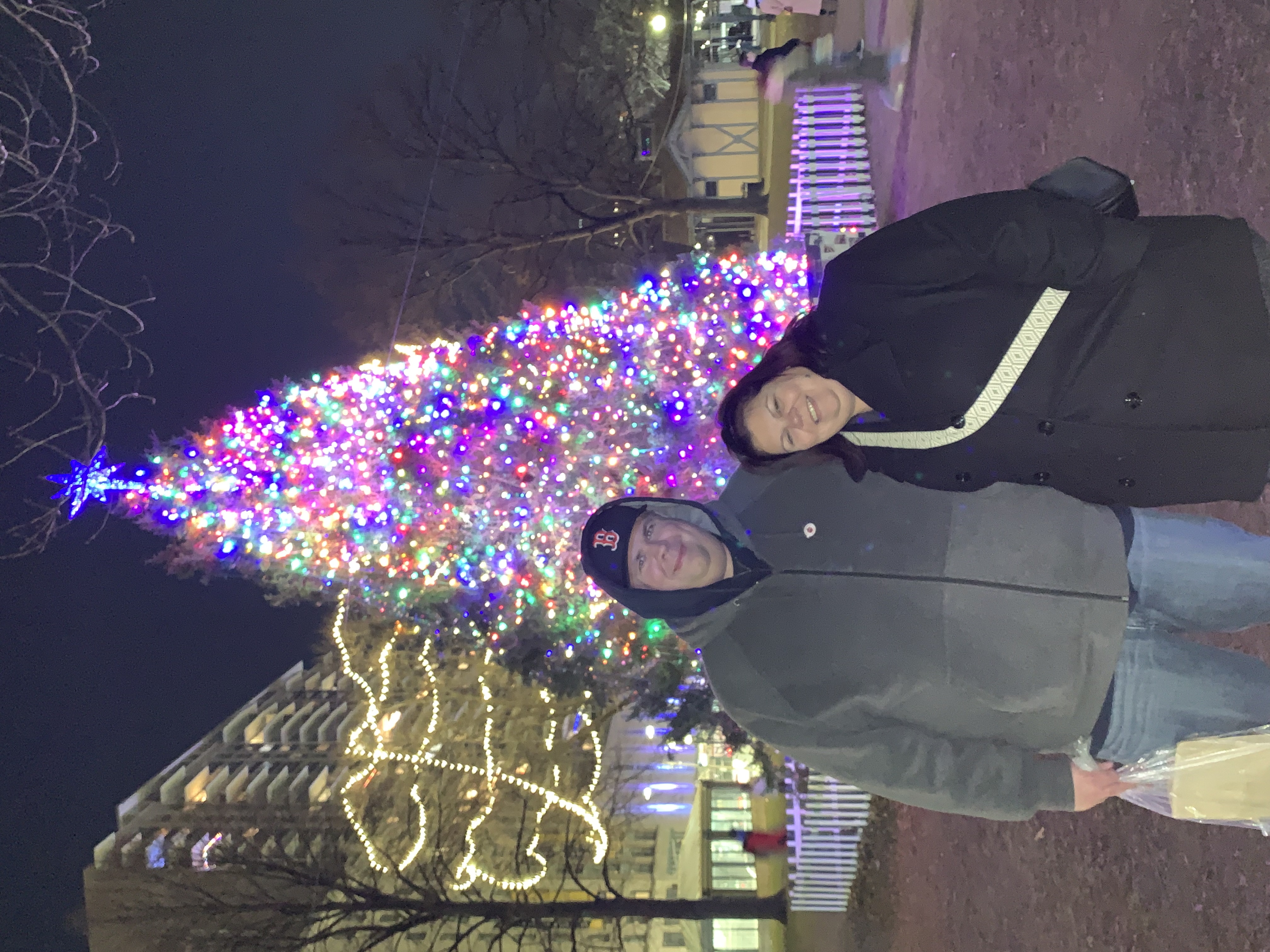 mike and michelle in front of park christmas tree